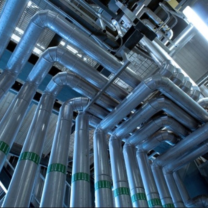 Close-up of industrial piping installed by Bold Builders